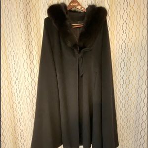 100% wool black coat with cape and fox trim.